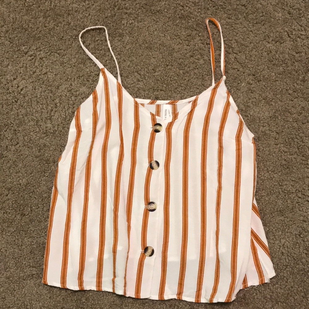 Striped rusted and white colored tank with buttons that work. Spaghetti straps.